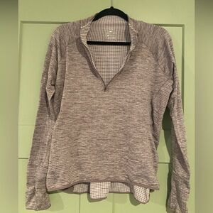 Nike dri-fit three quarter zip pull over.